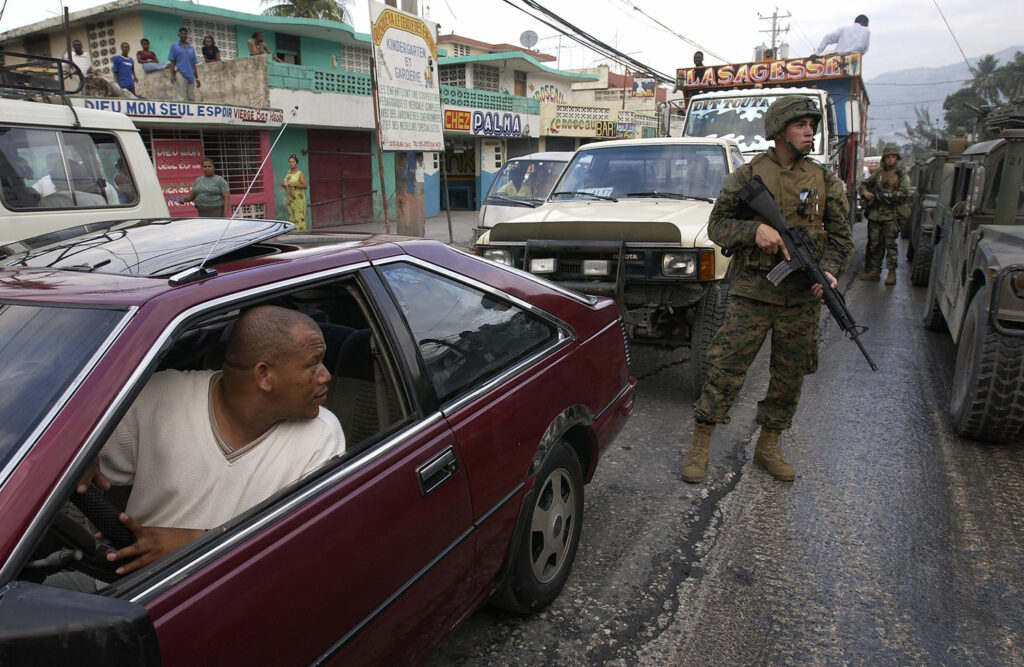 O golpe contra o presidente haitiano Jean Aristide